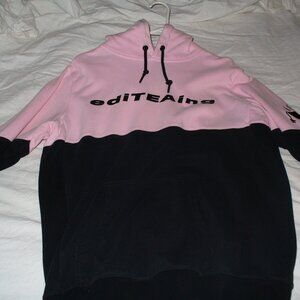 Shane Dawson EdiTEAing hoodie pink and black.
